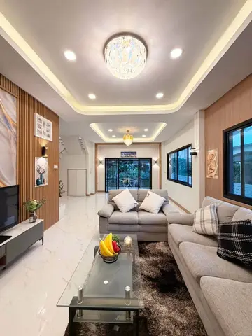 Ground-floor living room. The furniture shown is staging