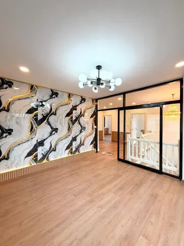 Upstairs room looking towards the stair landing