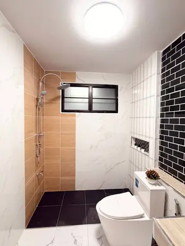Bathroom with white, wood-look and black tiles and a shower